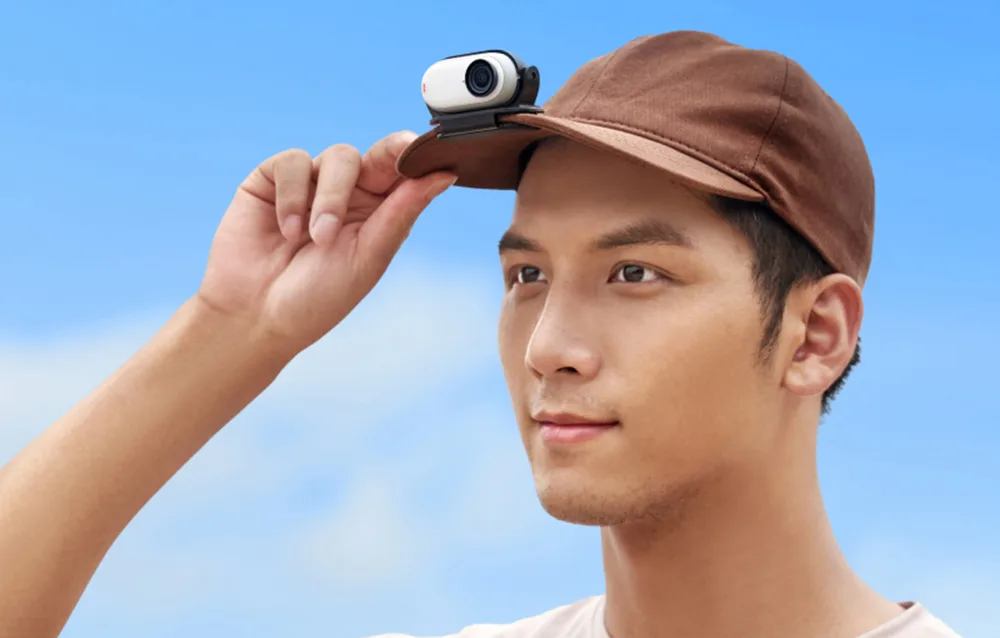 Insta360 GO 3 and GO 3S Easy Clip mount attached to a cap for hands-free POV recording