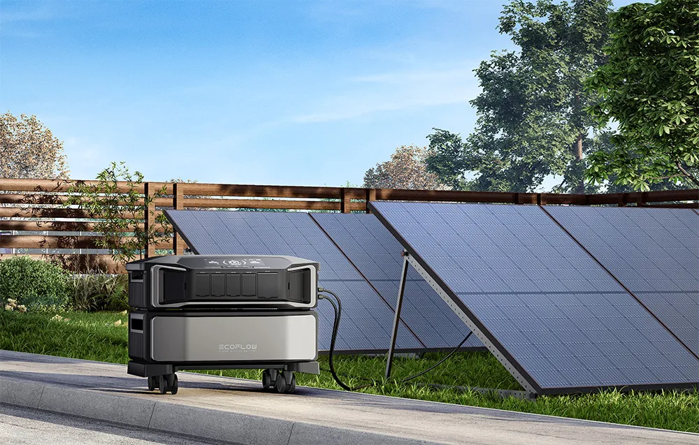 EcoFlow power station placed next to solar panels in a garden