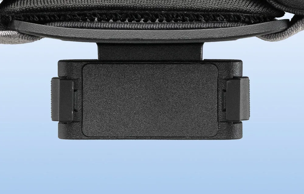 Close-up of the DJI Osmo Nano magnetic headband mount with visible side clips
