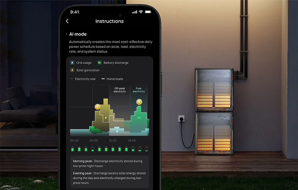 Smartfon z aplikacją do zarządzania energią obok pionowo ułożonych magazynów energii z widocznymi akumulatorami