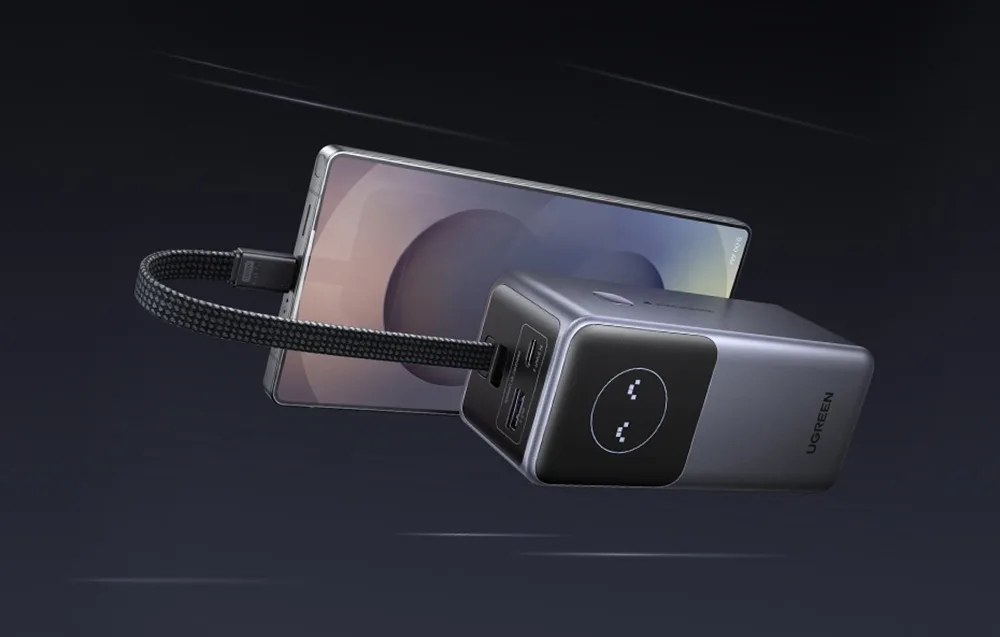 Ugreen PB723 power bank charging a smartphone with the built-in USB-C cable