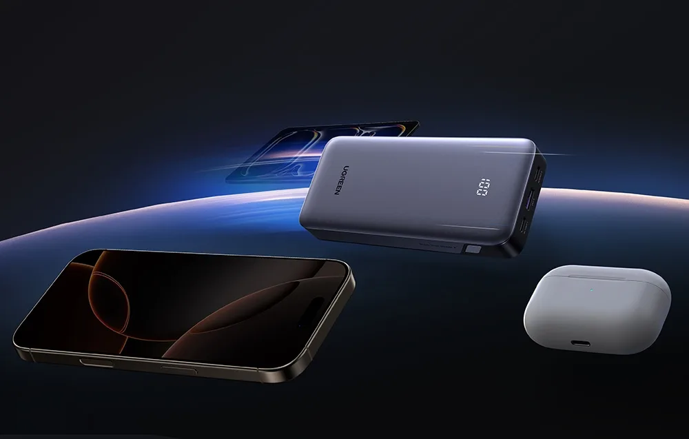 Ugreen power bank surrounded by various mobile devices ready for charging