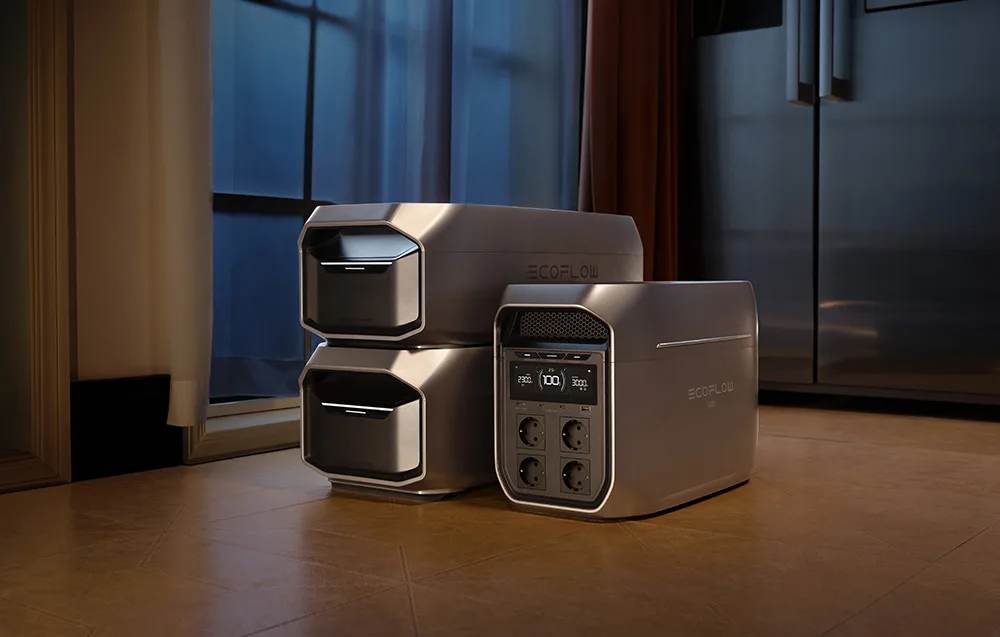 EcoFlow modular power system with three batteries and the main power station placed on the floor by a window.