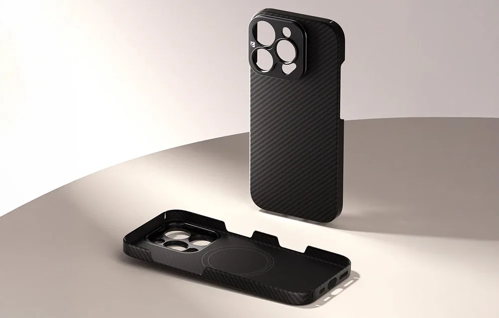 Black Freewell Kevlar case for iPhone 16 Pro Max standing upright with rear section open to show internal construction