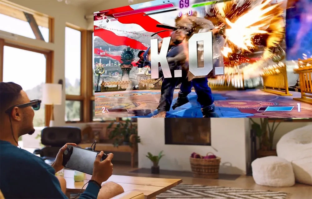 Man wearing VITURE XR Luma Pro glasses playing a fighting game on a handheld console with a large virtual screen