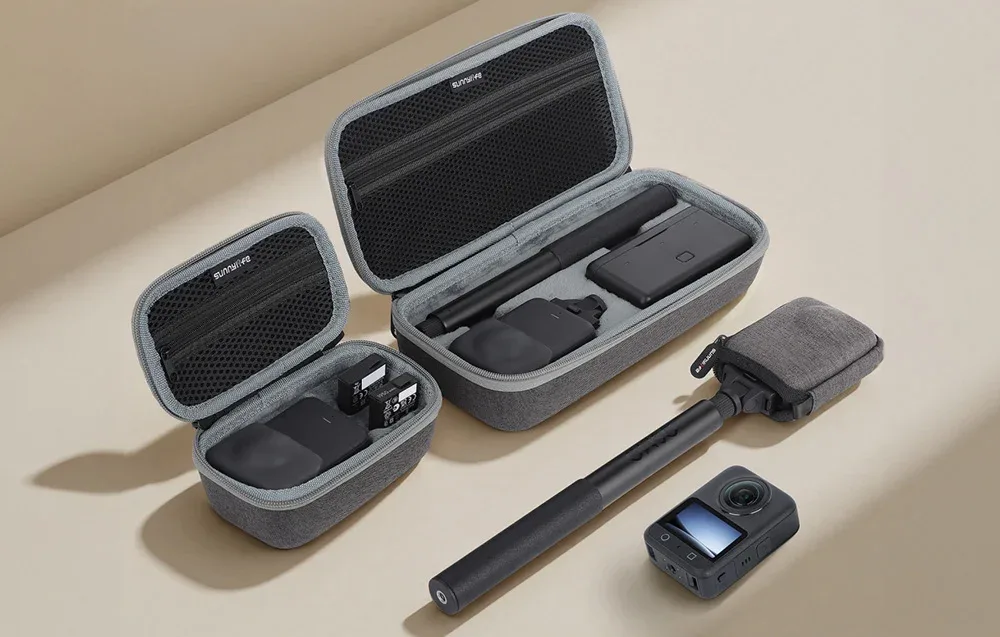 Sunnylife case set and accessories including two open cases, a 360 camera, and a selfie stick on a beige background
