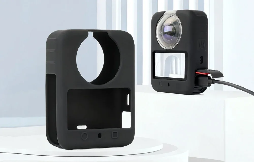 Black Sunnylife silicone camera cover for DJI Osmo 360 with charging cable connected