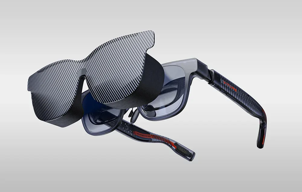 VITURE XR glasses with sun shield attached on a gray background