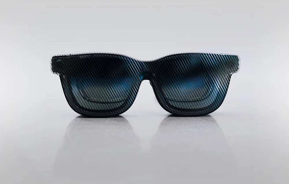 VITURE glasses with sun shield on a gray background