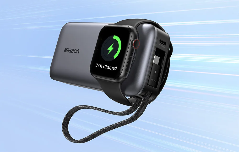 Smartwatch connected to a gray UGREEN power bank with built-in cable