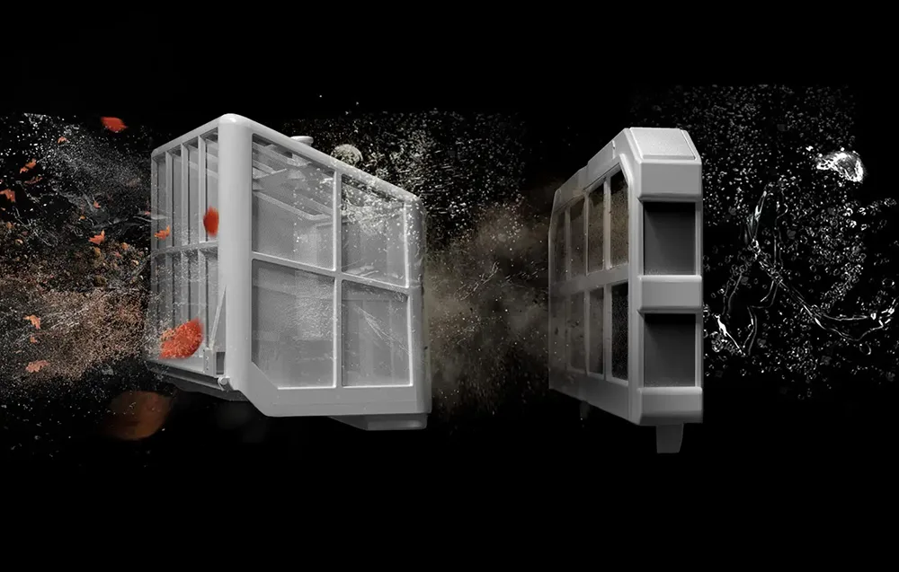 Dual filter baskets for the WYBOT S2 Solar Vision shown with water and debris on a dark background