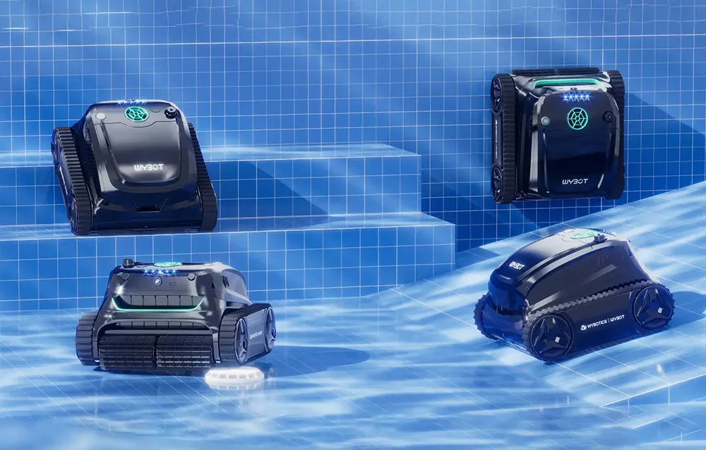 Four WYBOT pool robots in different positions on the pool floor