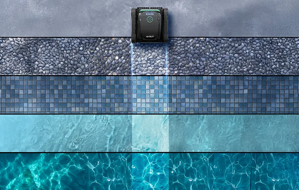 Top view of the WYBOT S2 Solar Vision pool cleaner moving across different pool surfaces