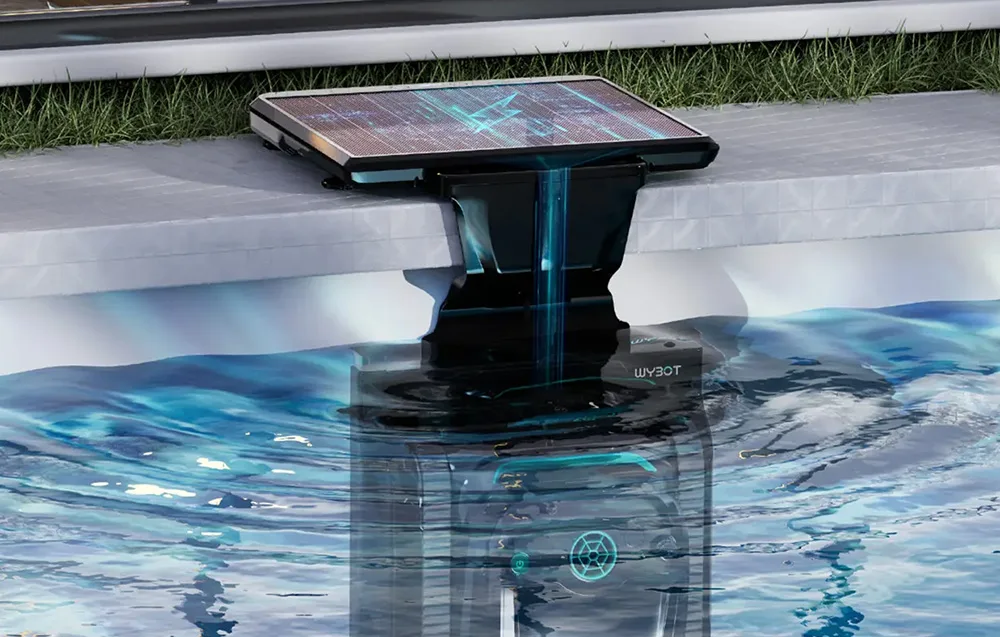 Solar charging dock with Wybot S2 Solar pool robot partially submerged in water