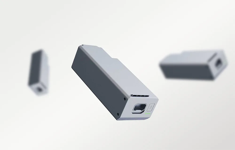 Three UNITREE A2 batteries on a gray background
