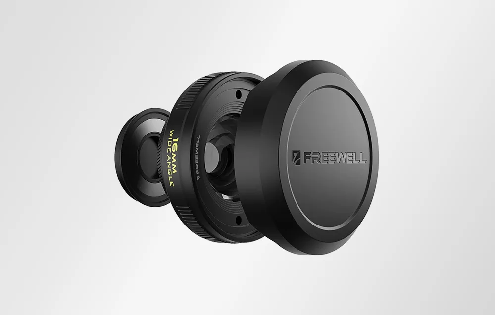 Czarny obiektyw szerokokątny Freewell 16mm pokazany z profilu na jasnym tle