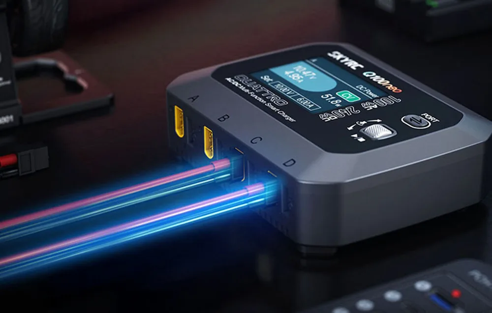 SkyRC Q100neo charger with a connected charging cable and display showing battery status.