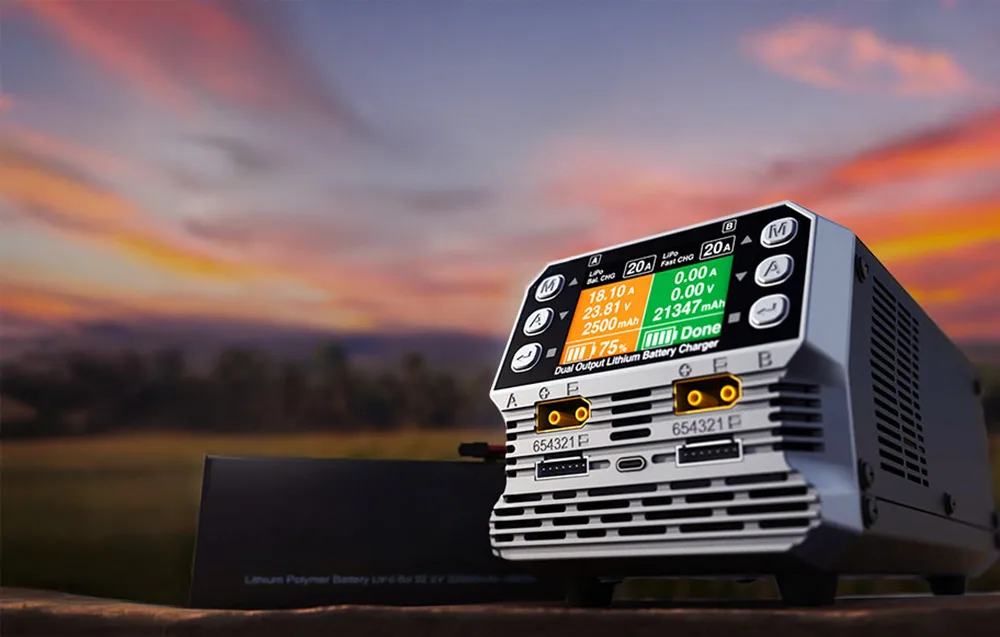 SkyRC PC1080neo dual-channel lithium battery charger at sunset