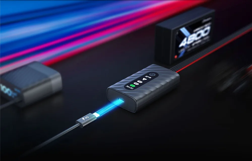 SkyRC Type35 charger connected to a USB-C PD cable on a dark background.