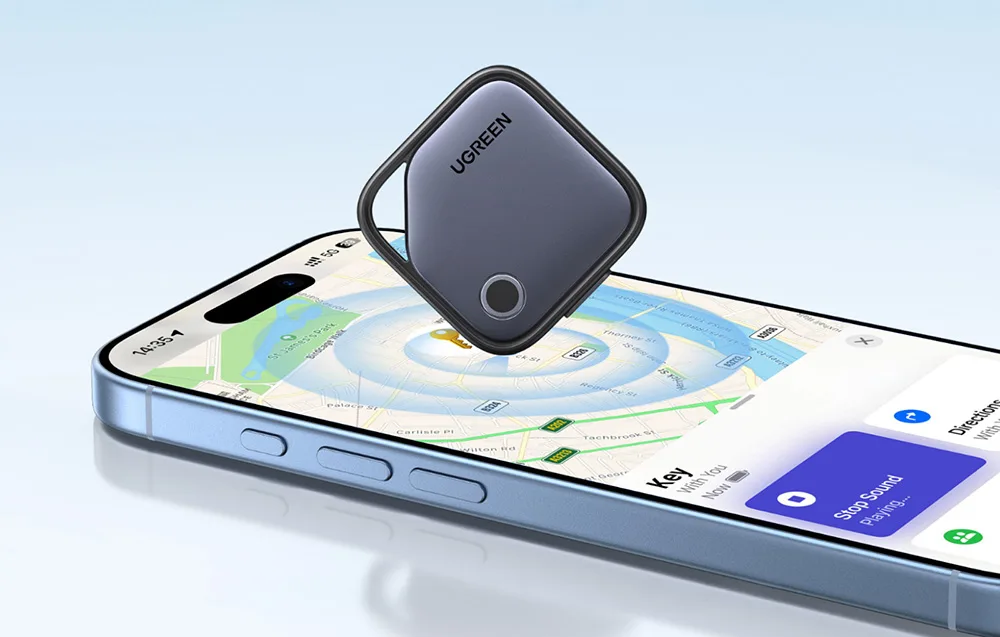 UGREEN smart tracker floating above a smartphone with an open map showing tracking functionality.