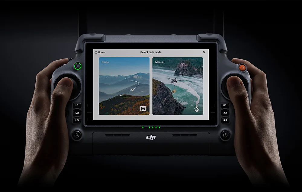 Hands holding the DJI RC Plus 2 controller with flight mode selection menu on the screen