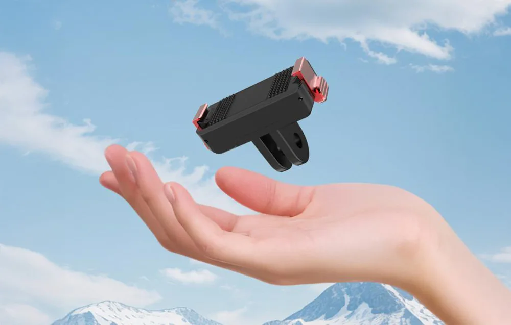 Hand holding the lightweight Puluz magnetic adapter