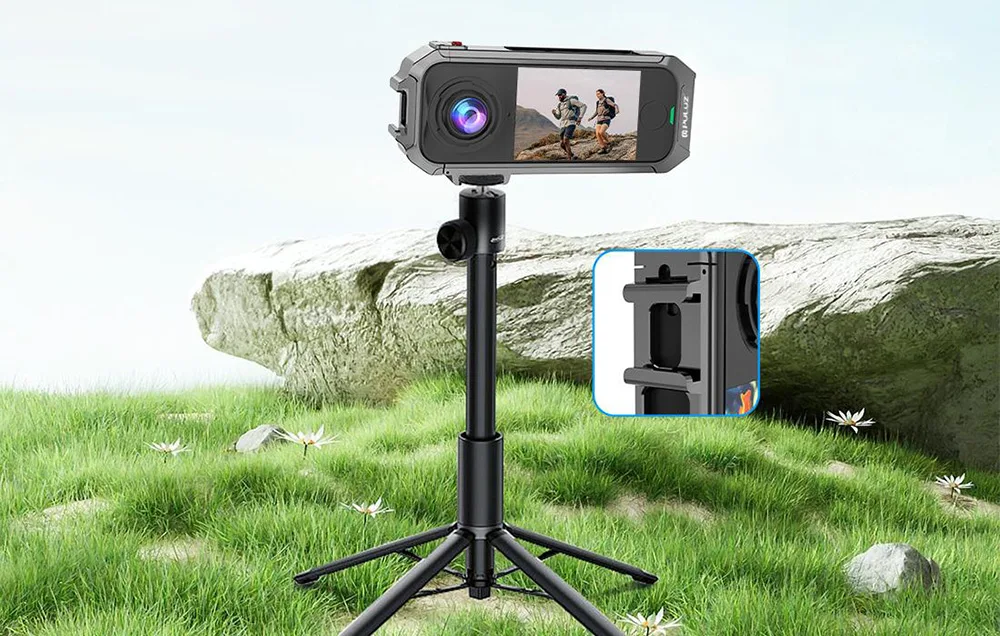 Insta360 X4 Air mounted on a tripod with the Puluz metal protective case outdoors on grass
