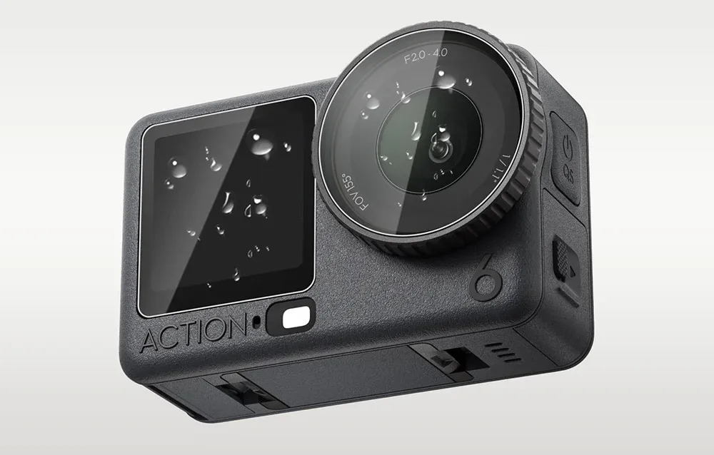 Action camera screen and lens covered with water droplets