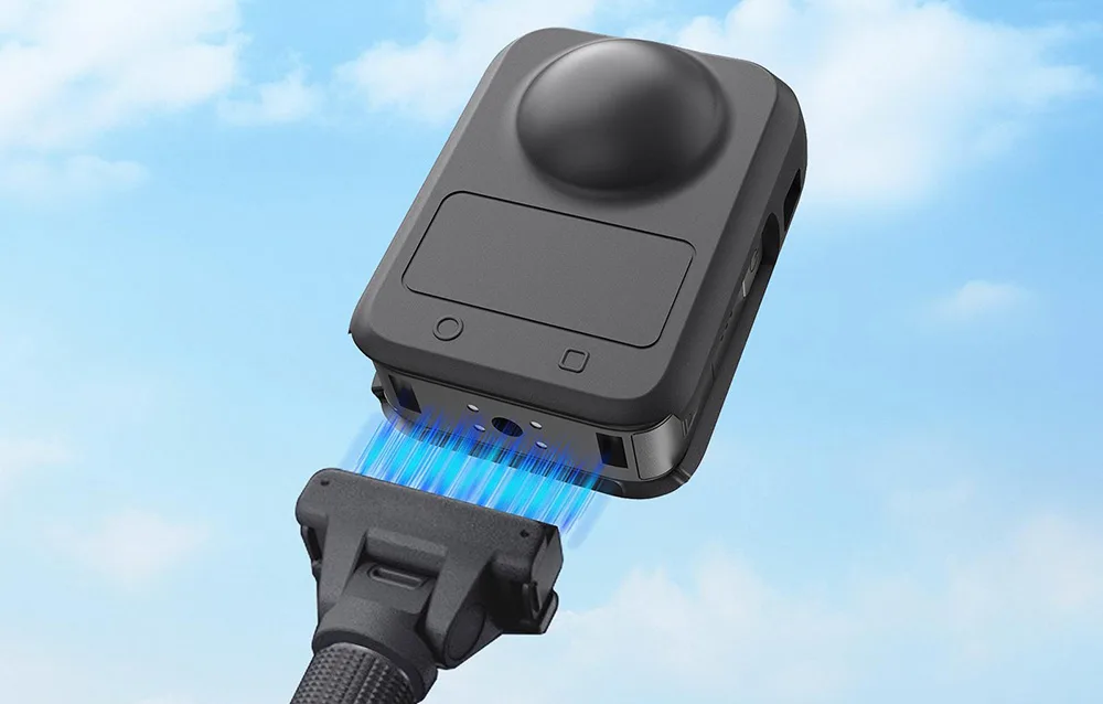DJI Osmo 360 in a black silicone protective case mounted on an accessory handle
