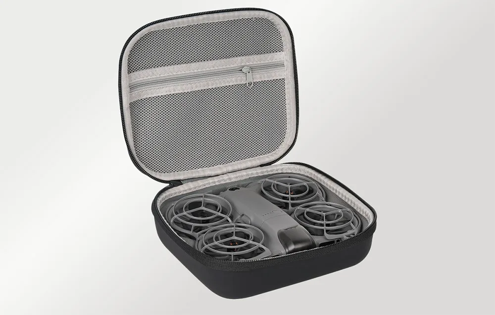 Black Sunnylife case with a mesh pocket, opened with a drone stored inside