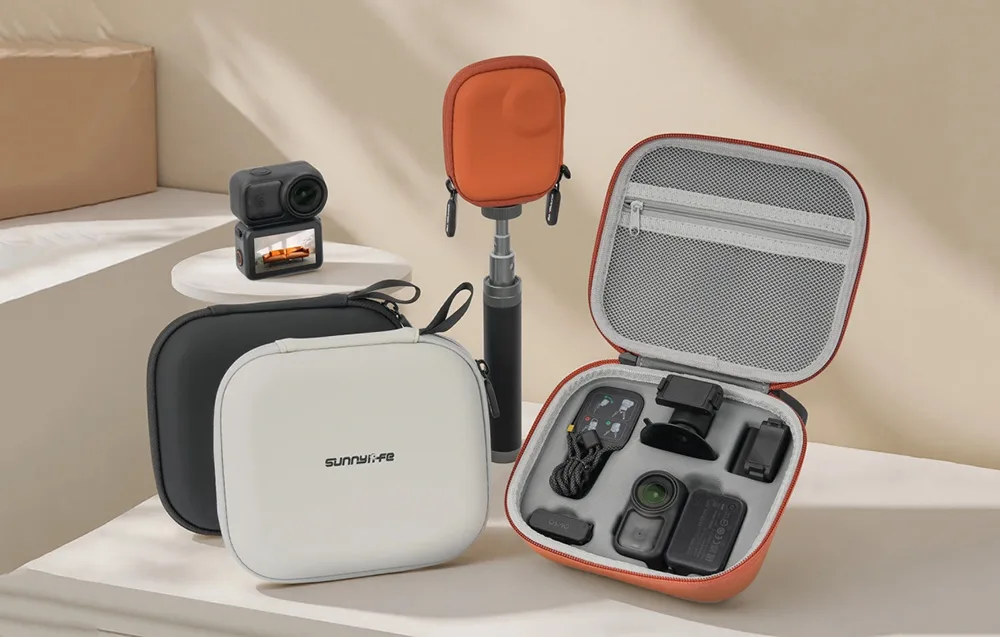Sunnylife case with camera, tripod, and accessories on a table