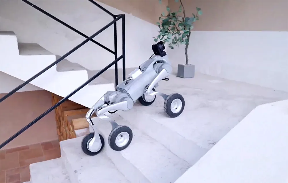 Unitree robot with wheels climbing concrete stairs in a minimalist interior