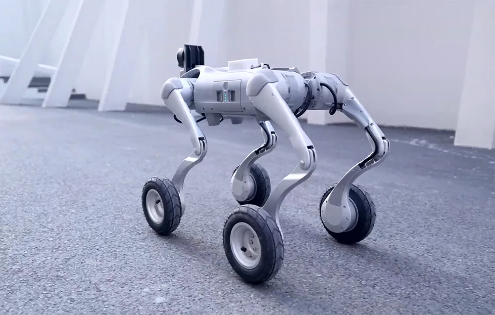 Unitree robot with wheels standing in a modern interior with white columns