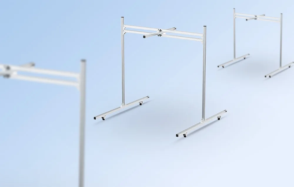Three silver protective frames for Unitree robots on a light background