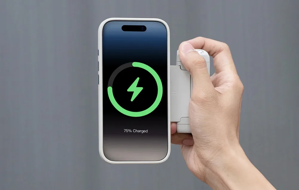 Smartphone with PGYTech MagCam 2 grip showing a wireless charging screen at 75 percent