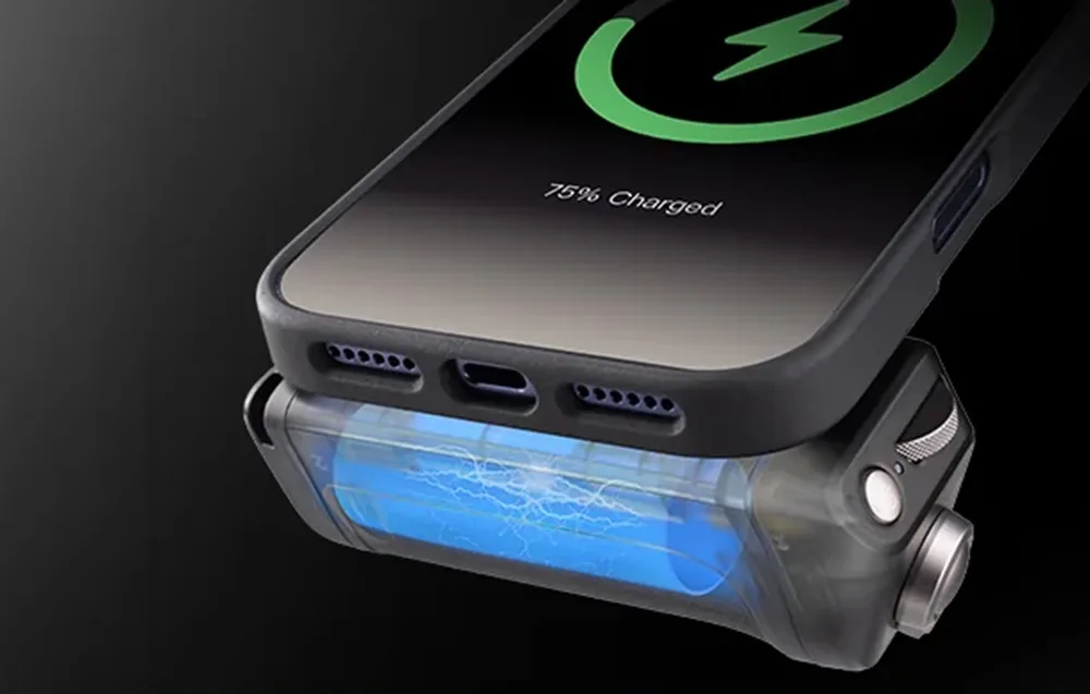 Smartphone wirelessly charging on the PGYTech MagCam 2 grip with 75 percent battery visible on screen