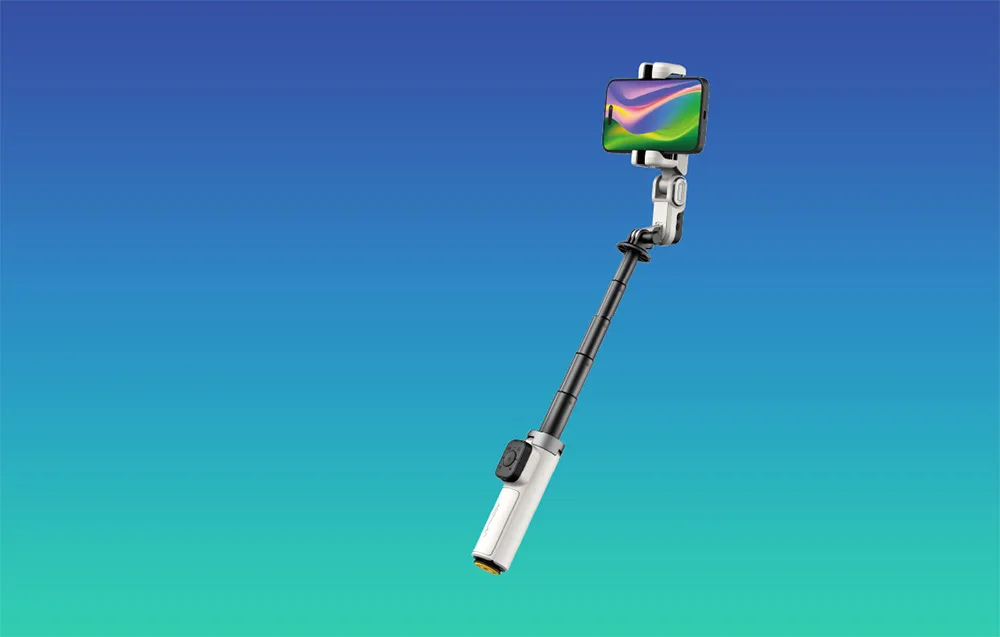 White AOCHUAN M3 Pro Mini gimbal with a smartphone on the fully extended pole on a blue turquoise background.