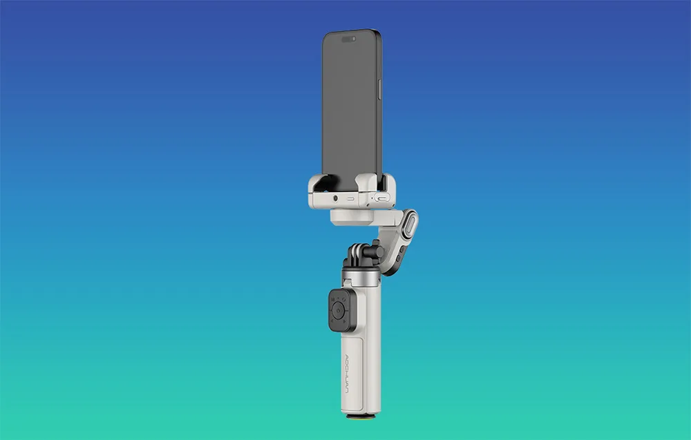 White AOCHUAN M3 Pro Mini gimbal with a smartphone in vertical position without tripod on a blue turquoise background.