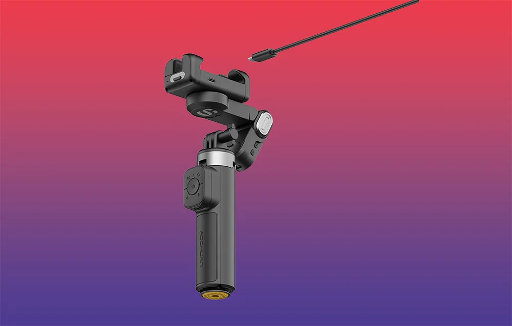 Gimbal bez smartfona z kablem USB-C unoszącym się nad uchwytem na gradientowym tle czerwono-fioletowym.