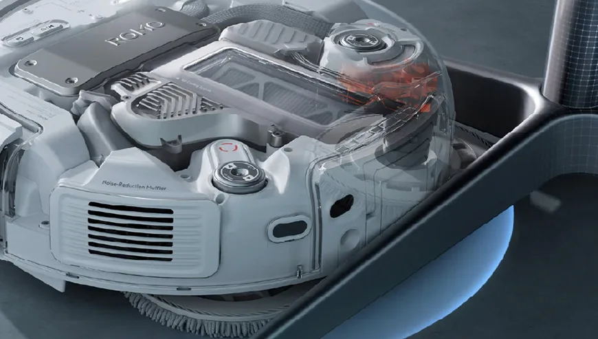 Close-up of the internal components of the DJI ROMO robot vacuum with a partially transparent body